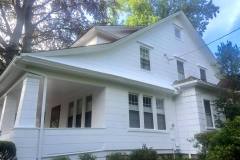Long Island Painters restore a home's exterior by painting it white