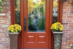 Front door gel stained in a brown color by Long Island House Painting company American Made Painting