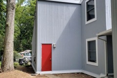 House exterior painted gray by Long Island House Painters